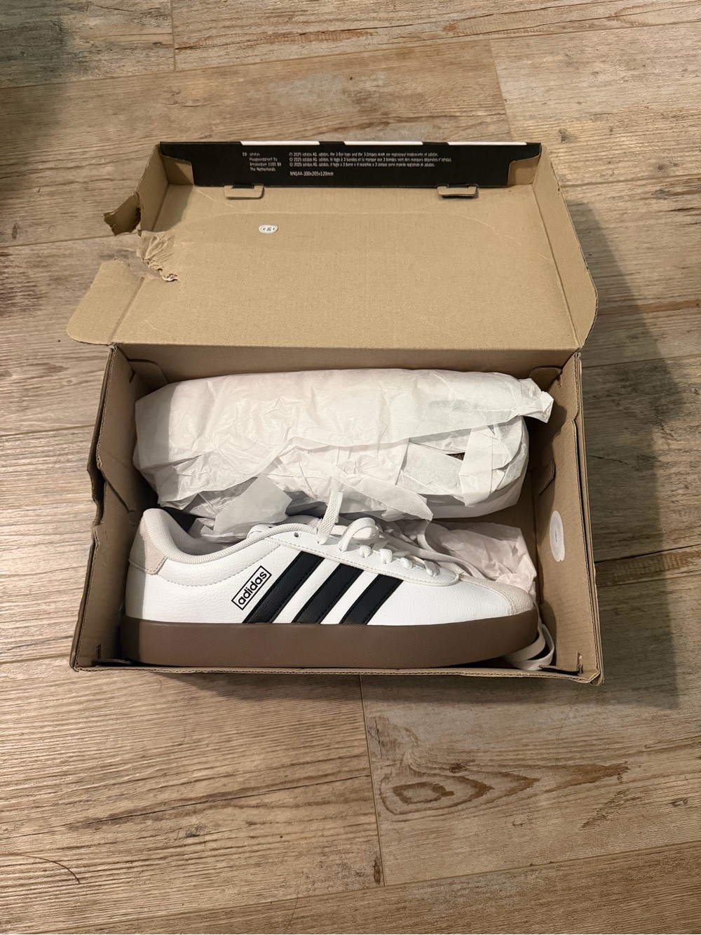 adidas White Sneakers with Black Stripes and Brown Sole